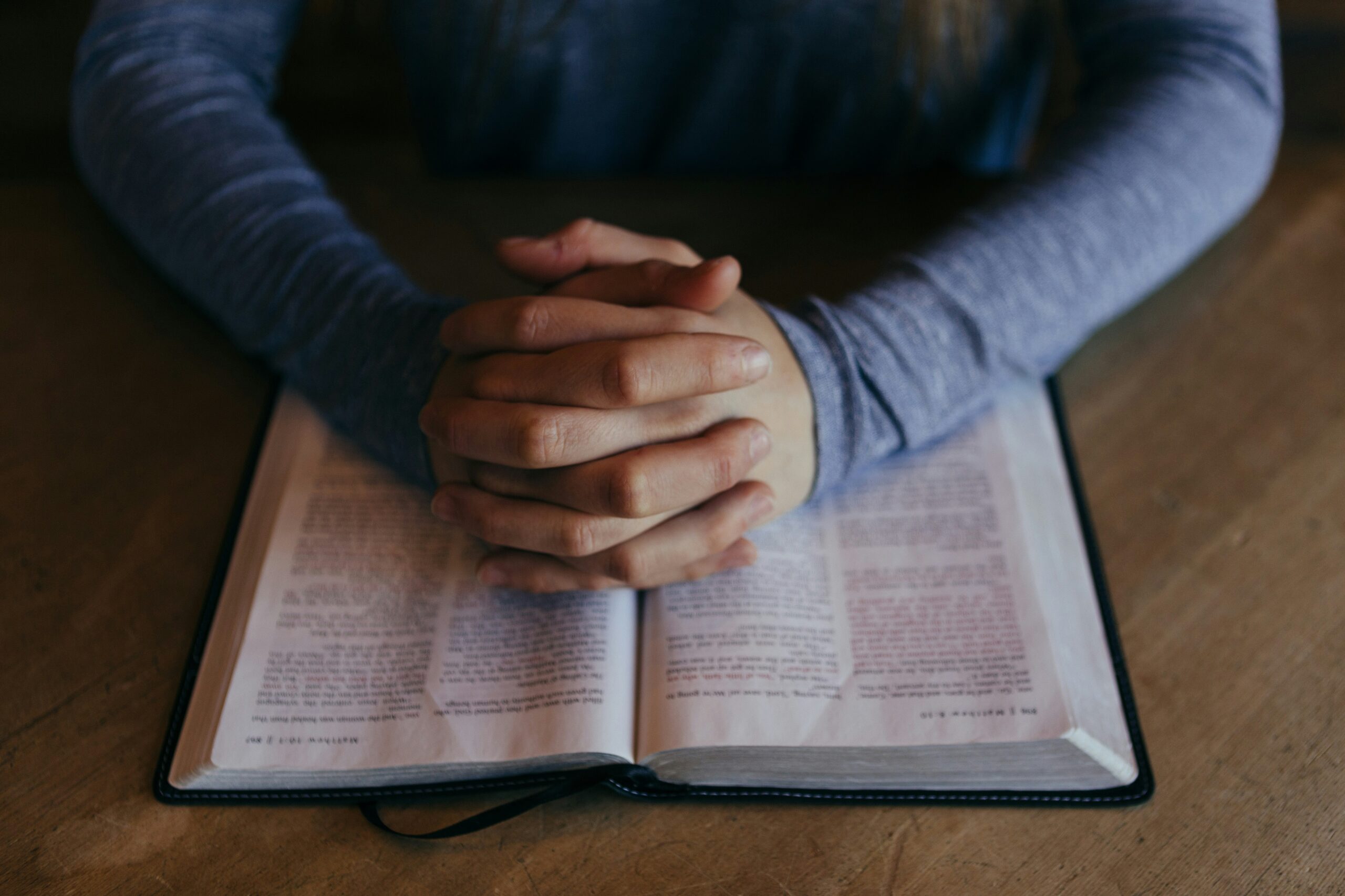 Photo by <a href="https://unsplash.com/@patrickian4?utm_source=unsplash&utm_medium=referral&utm_content=creditCopyText">Patrick Fore</a> on <a href="https://unsplash.com/photos/man-holding-his-hands-on-open-book-b_SHPU5M3nk?utm_source=unsplash&utm_medium=referral&utm_content=creditCopyText">Unsplash</a>      