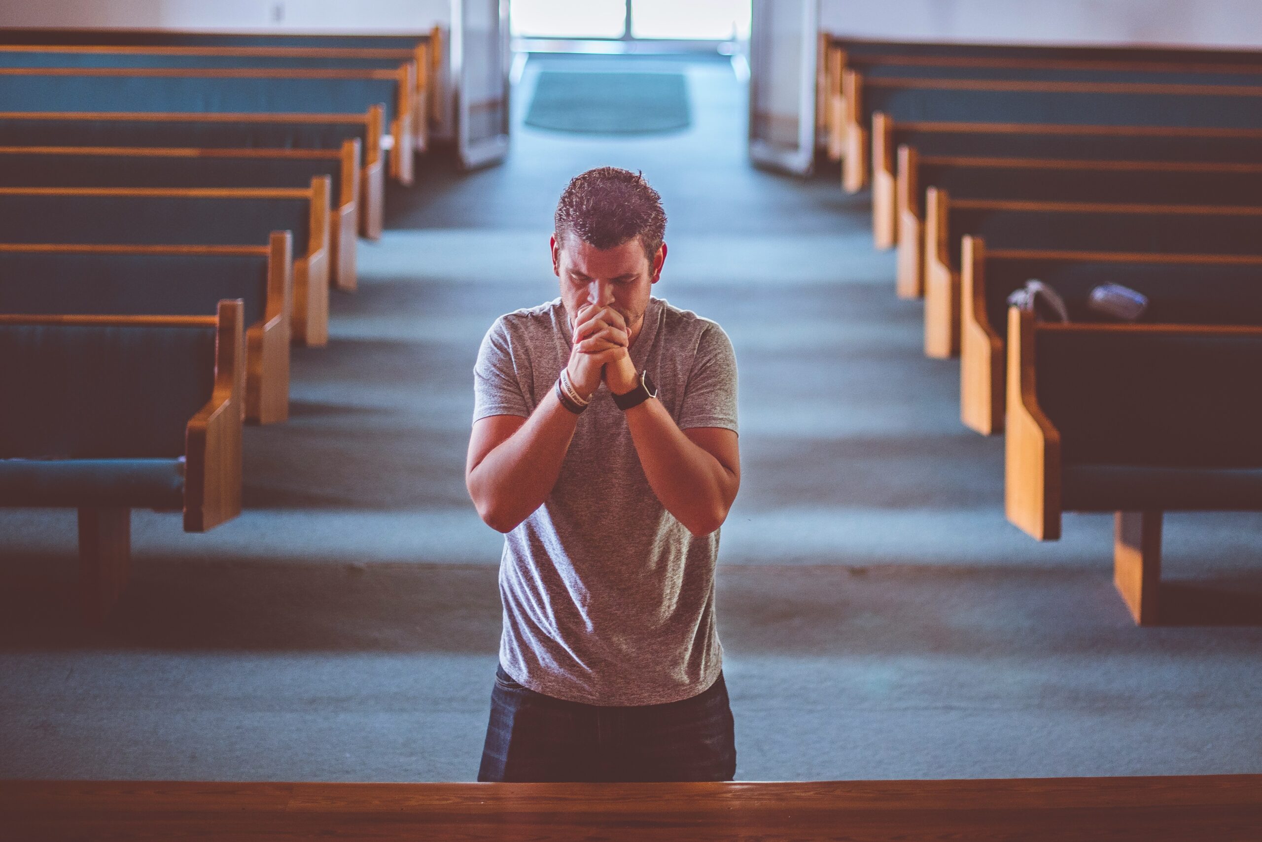 Photo by <a href="https://unsplash.com/@benwhitephotography?utm_source=unsplash&utm_medium=referral&utm_content=creditCopyText">Ben White</a> on <a href="https://unsplash.com/photos/man-standing-near-altar-praying-1urNubNAQbI?utm_source=unsplash&utm_medium=referral&utm_content=creditCopyText">Unsplash</a>